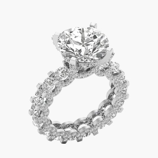 Diamond ring with a large central gemstone and smaller stones on a white background