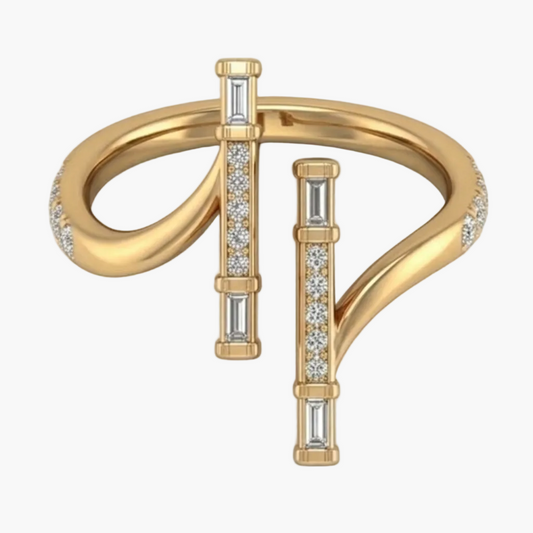 Gold ring with diamond accents on a light gray background