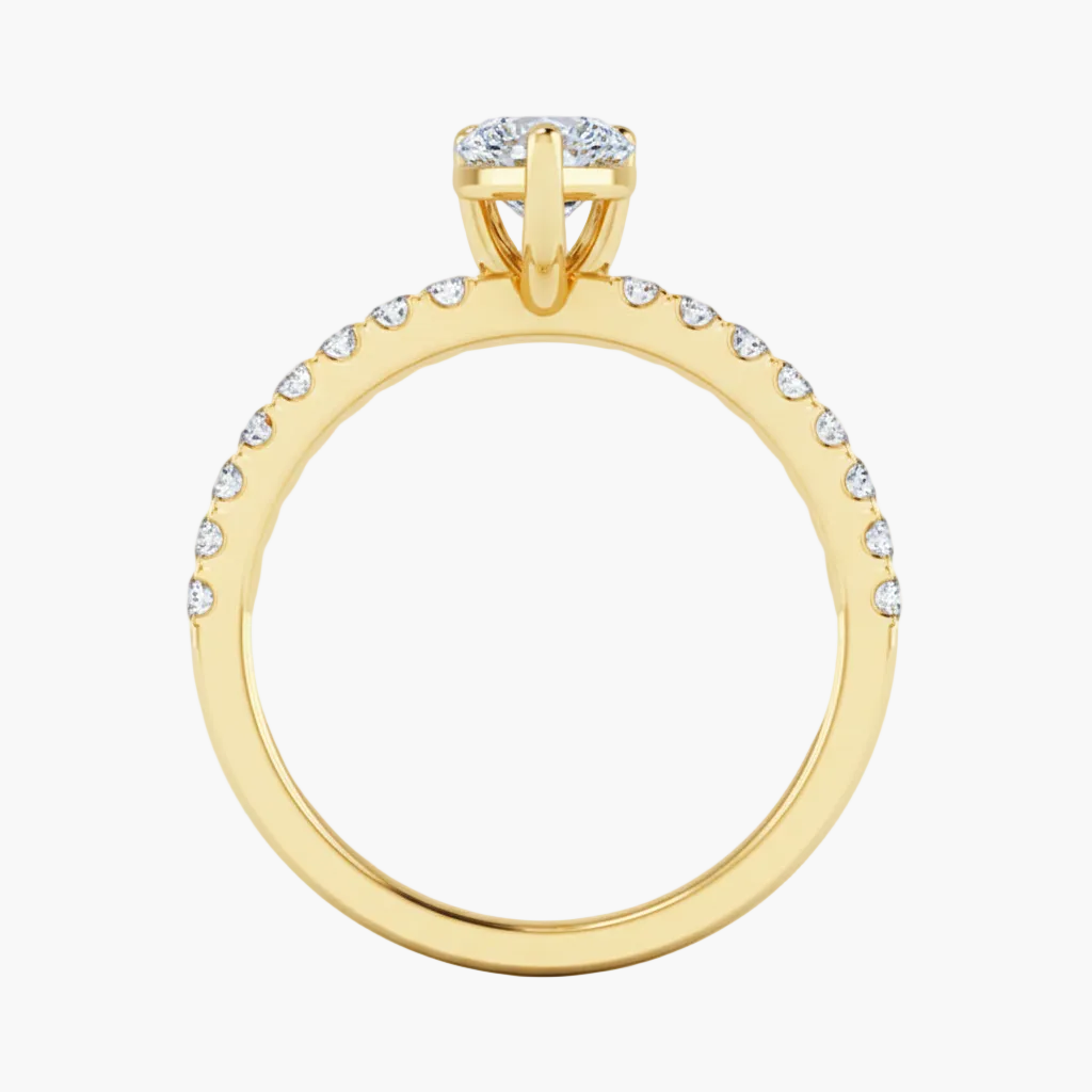 Gold ring with diamond accents on a white background