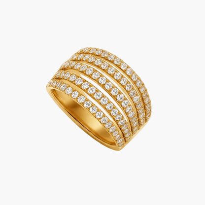 Gold ring with multiple diamond-studded bands on a light gray background
