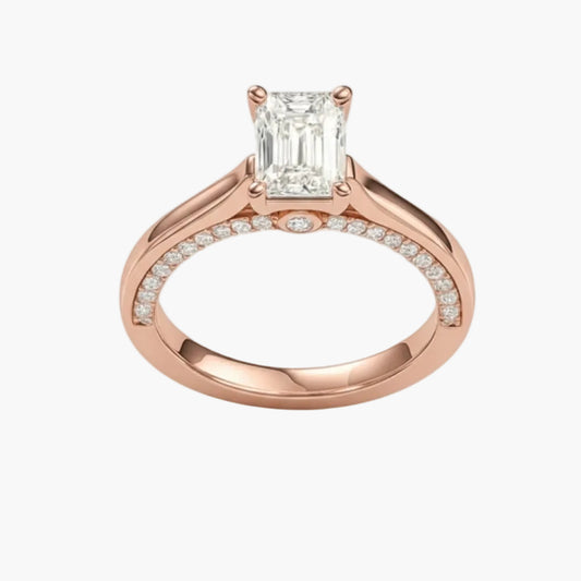 Rose gold ring with a diamond on a white background
