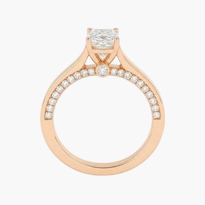 Rose gold ring with a diamond on a white background