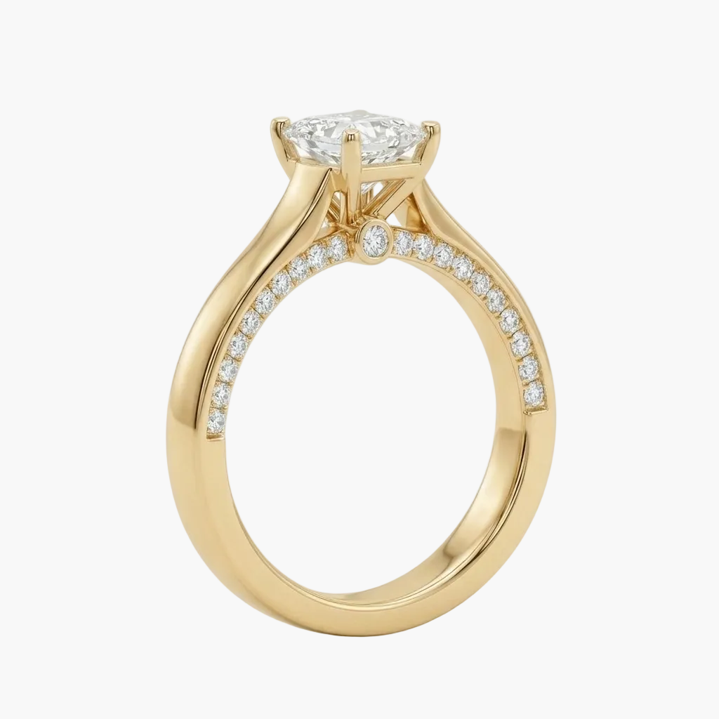 Gold ring with a diamond on a white background