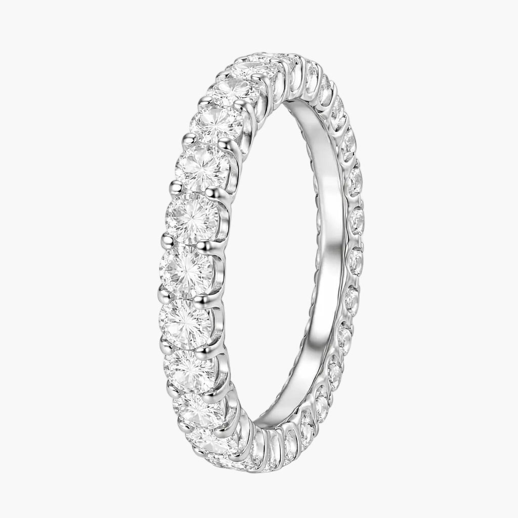 Silver ring with diamonds on a white background