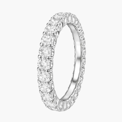 Silver ring with diamonds on a white background