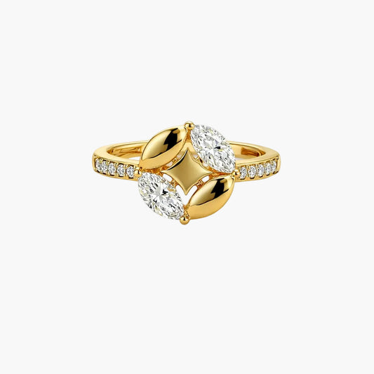 Gold ring with diamond accents on a white background