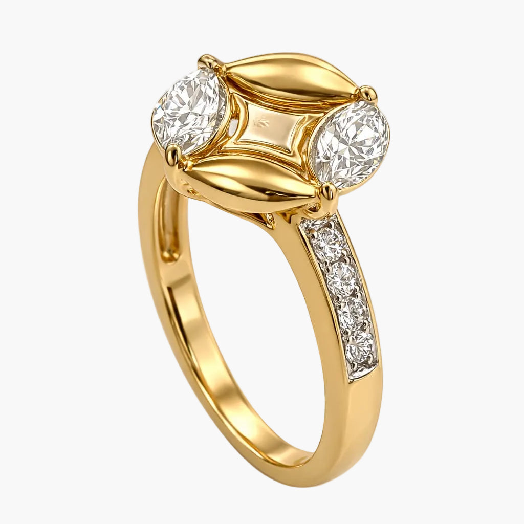 Gold ring with diamond accents on a white background