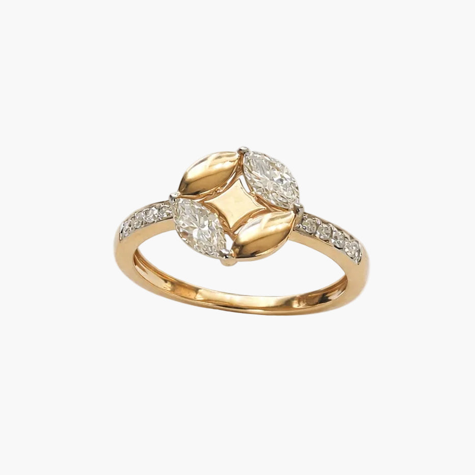 Gold ring with diamond accents on a white background