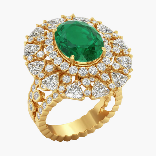 Gold ring with a green gemstone and diamond accents on a white background