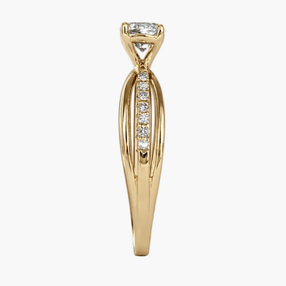 Gold ring with diamond accents on a white background