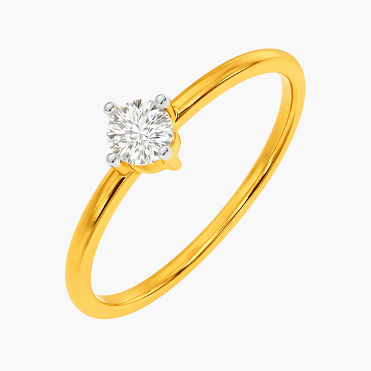 Gold ring with a diamond on a white background