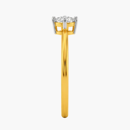 Gold ring with a diamond on a white background