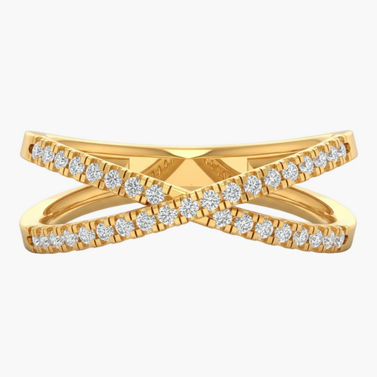 Gold ring with diamond accents on a white background