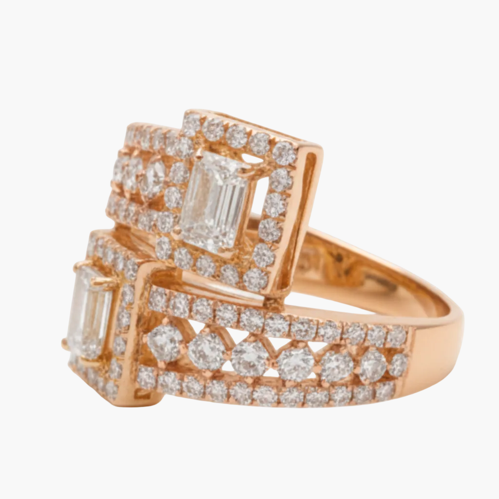 Rose gold ring with diamond accents on a white background