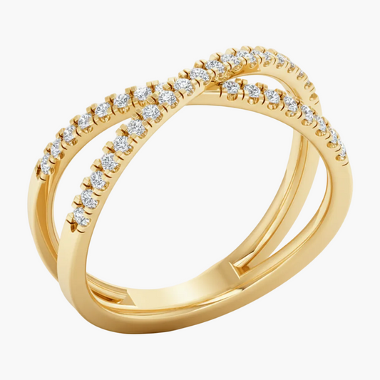 Gold ring with diamonds on a white background