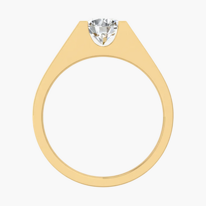 Gold ring with a heart-shaped diamond on a white background