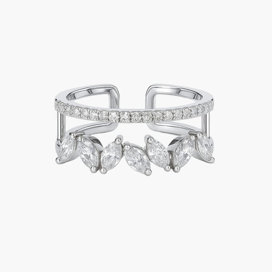 Silver ring with marquise-shaped gemstones on a white background