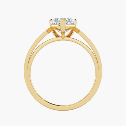 Gold ring with a diamond on a white background
