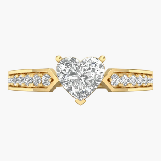 Gold ring with a heart-shaped diamond and smaller diamonds on the band against a white background