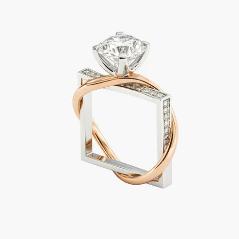 Two-tone diamond ring with rose gold and white gold on a white background