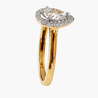 Gold ring with a diamond halo on a white background