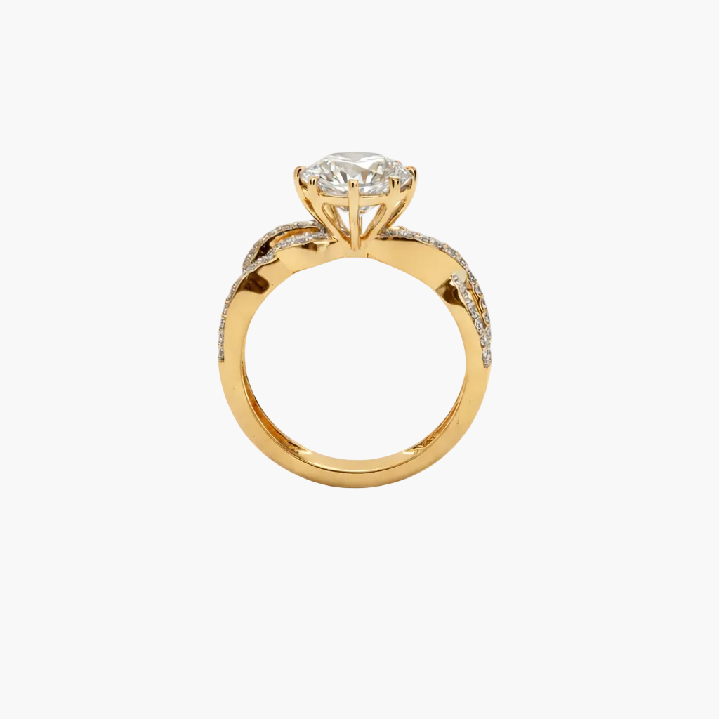 Gold ring with a diamond on a white background