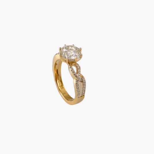 Gold ring with a diamond on a white cushion