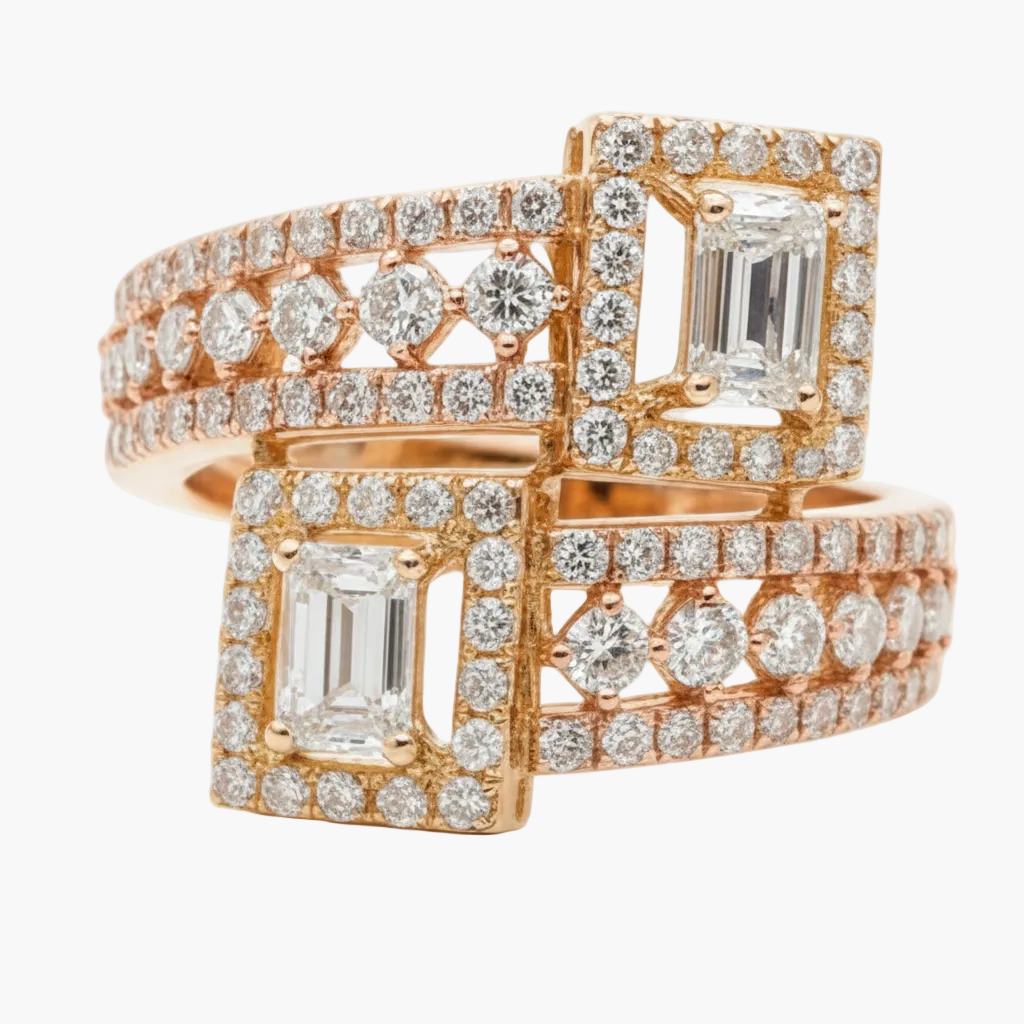 Rose gold ring with emerald-cut diamonds on a white background