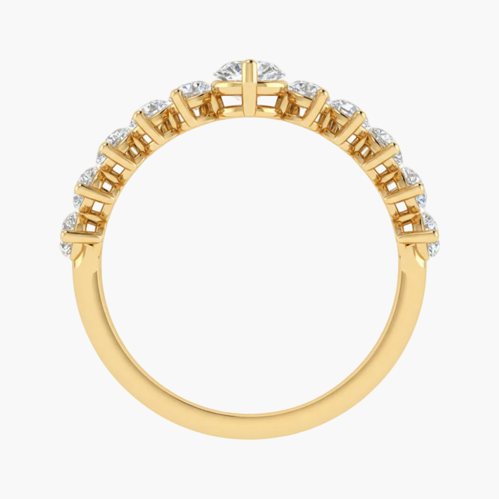 Gold ring with diamond accents on a white background