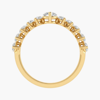 Gold ring with diamond accents on a white background