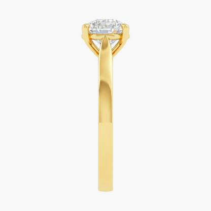 Gold ring with a diamond on a white background