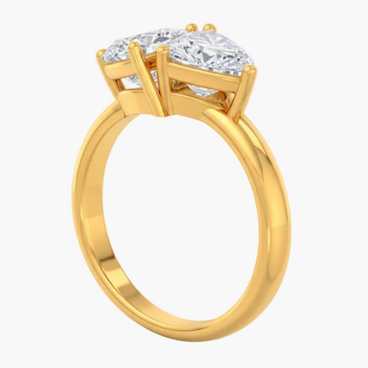 Gold ring with a diamond on a white background
