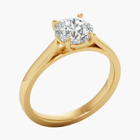 Gold ring with a diamond on a white background