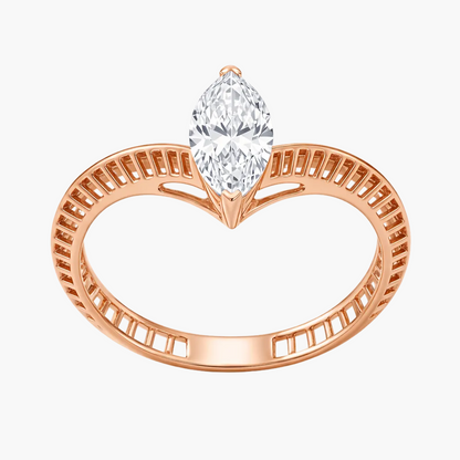 Rose gold ring with a pear-shaped diamond on a white background