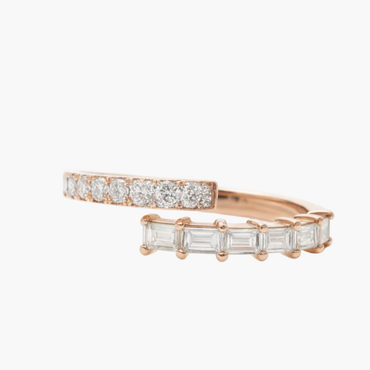 Two rose gold rings with diamond accents on a white background