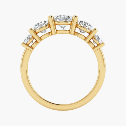 Gold ring with diamonds on a white background