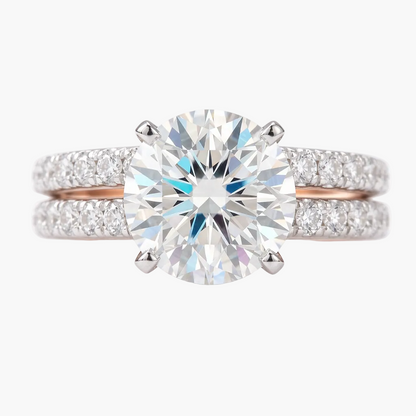 Diamond ring with a large central gemstone and smaller diamonds on a white background