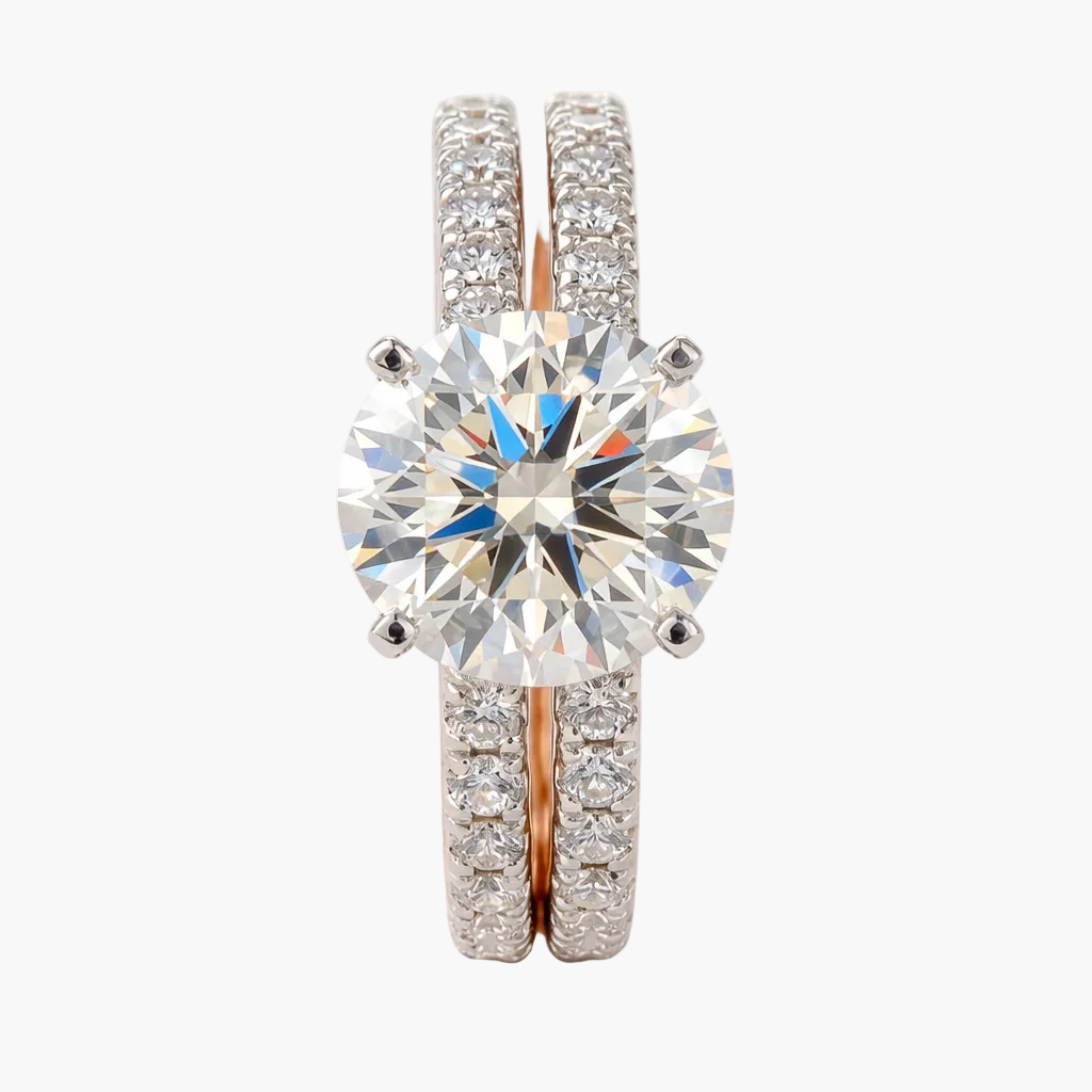 Diamond ring with rose gold band on a white background