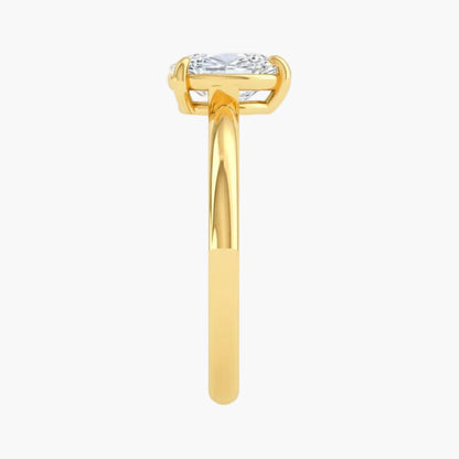 Gold ring with a diamond on a white background