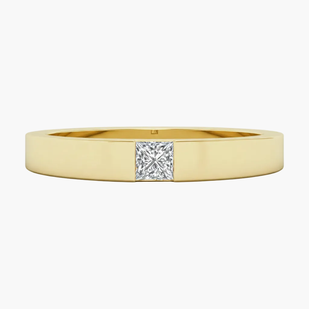 Gold ring with a diamond on a white background