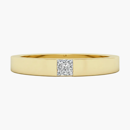 Gold ring with a diamond on a white background