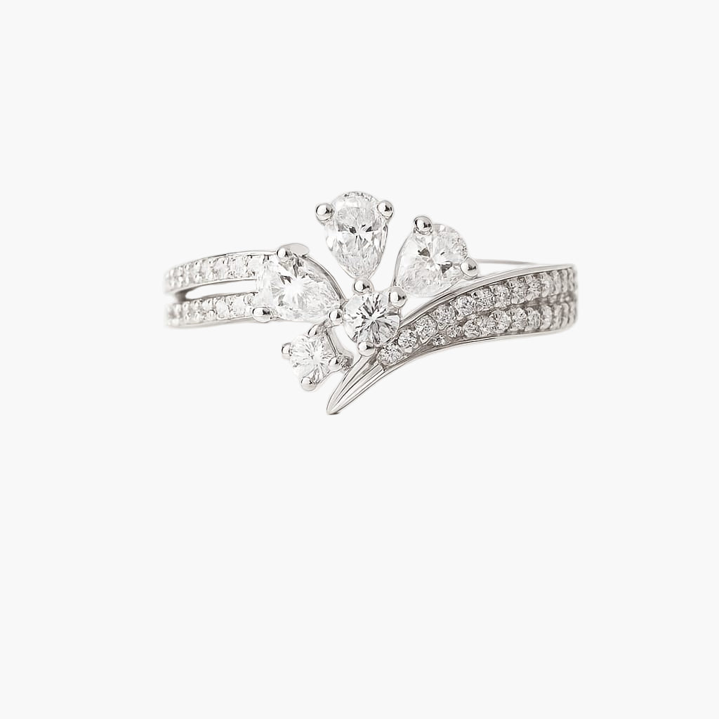 Silver ring with diamond accents on a white background