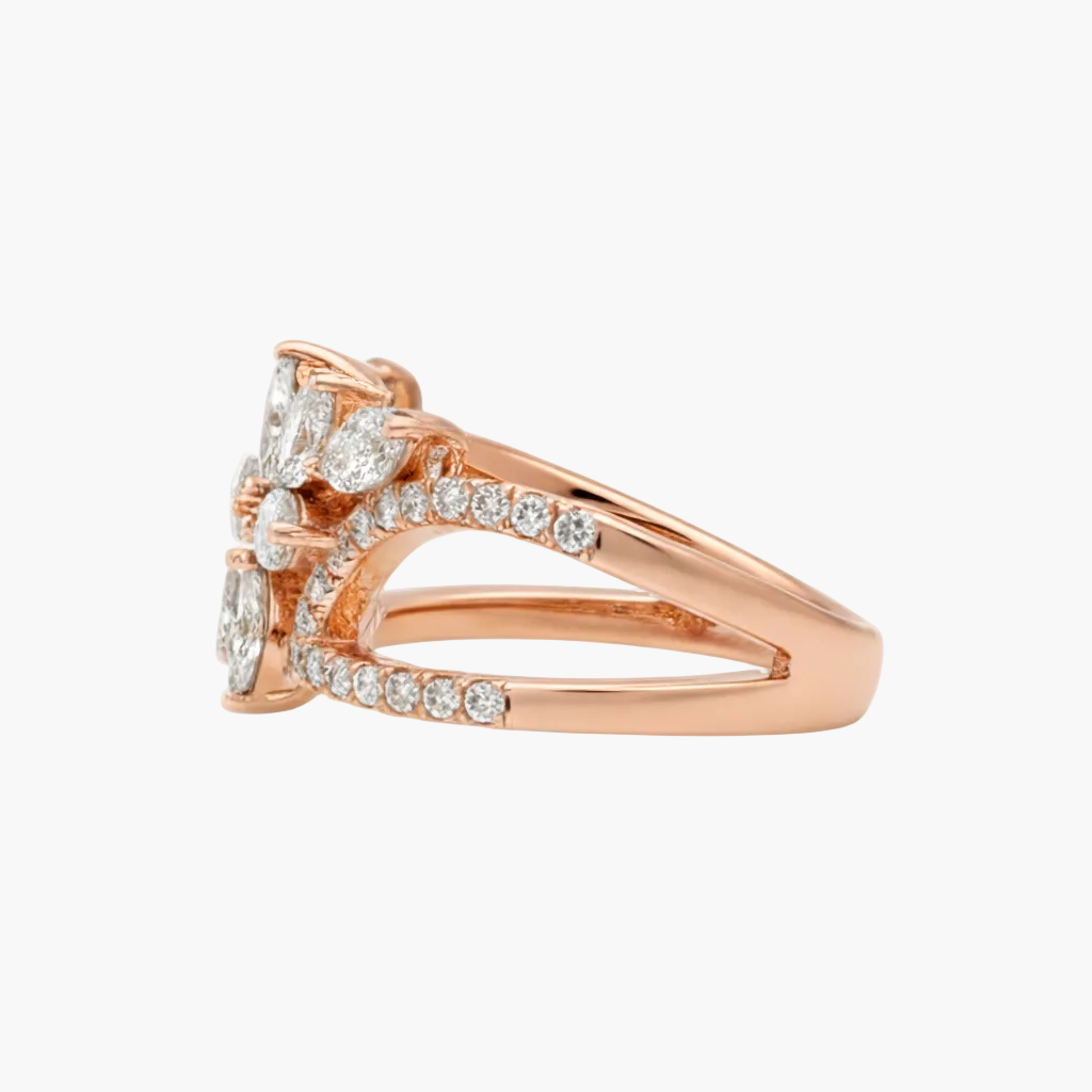 Rose gold ring with diamond accents on a white background