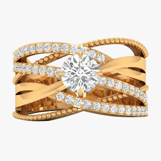 Gold ring with diamond accents on a white background