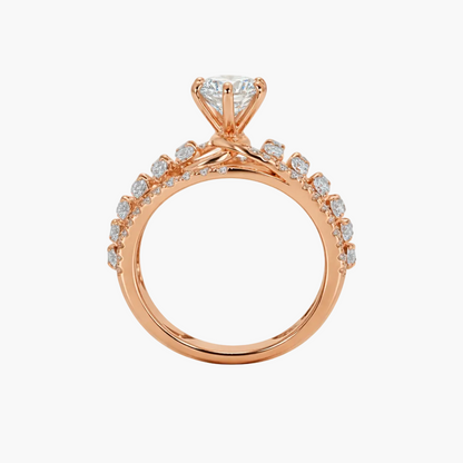 Rose gold ring with diamond accents on a white background