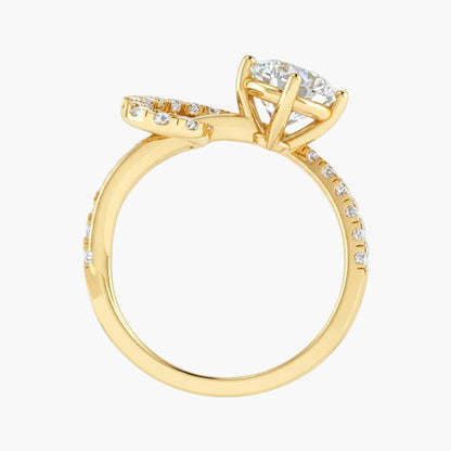 Gold ring with diamond accents on a light gray background