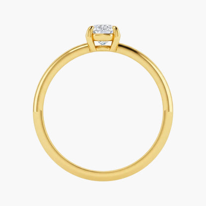 Gold ring with a diamond on a white background