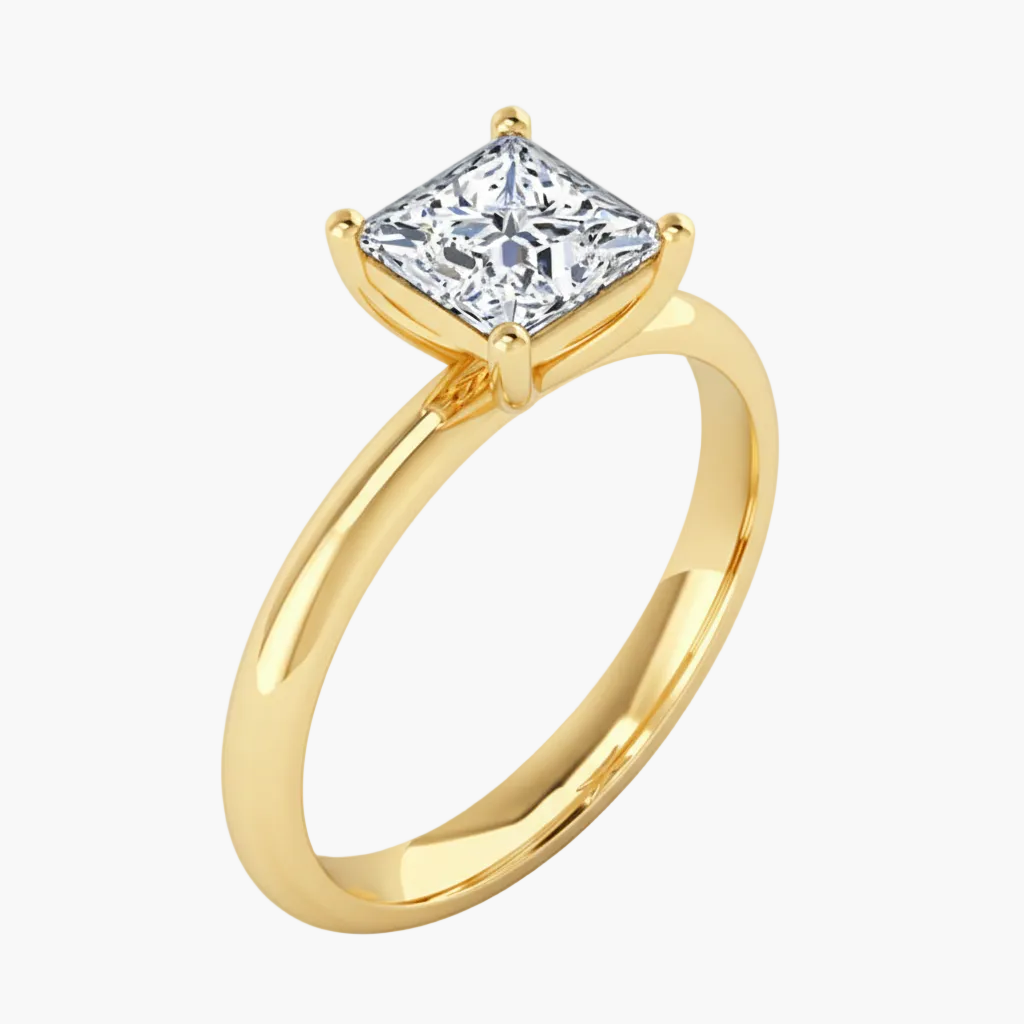 Gold ring with a large diamond on a white background