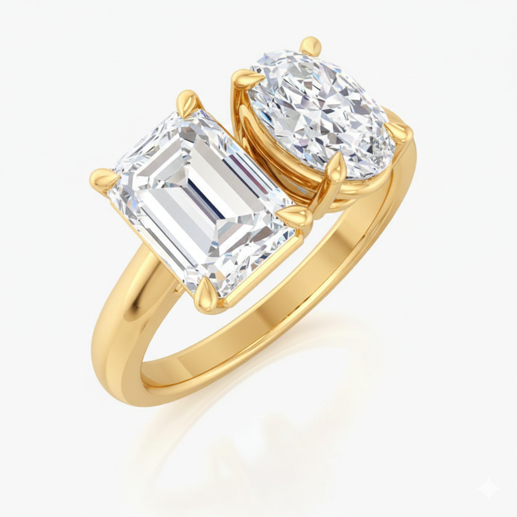Gold ring with two large diamonds on a white background
