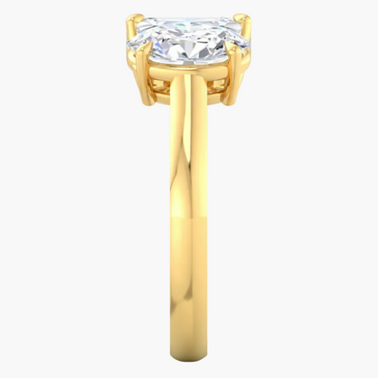 Gold ring with a diamond on a white background